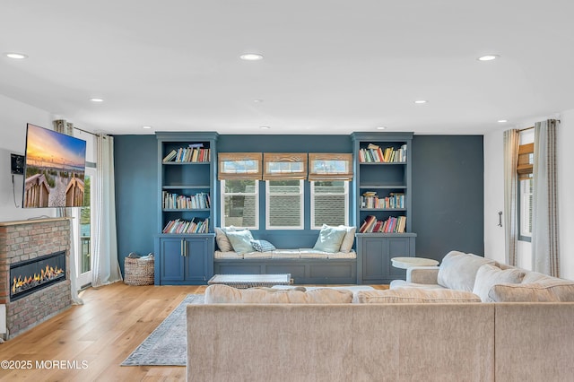 1417 Holmes Ave, Toms River, NJ 08753 - living area with a fireplace, recessed lighting, and wood finished floors