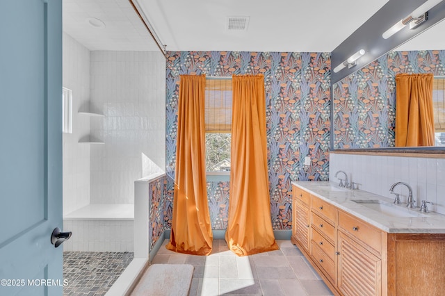 1417 Holmes Ave, Toms River, NJ 08753 - full bath with wallpapered walls, a walk in shower, and double vanity
