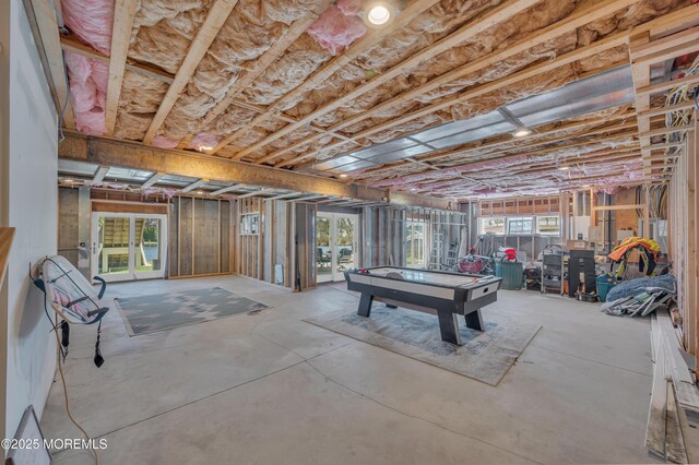 1417 Holmes Ave, Toms River, NJ 08753 - recreation room featuring unfinished concrete flooring and plenty of natural light