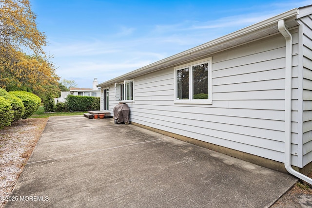 view of home's exterior featuring a patio area