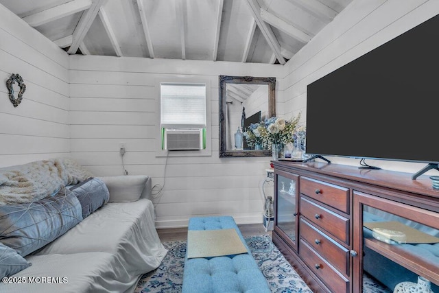 19 Gravelly Point Rd, Highlands, NJ 07732 - living area with wooden walls, wood finished floors, cooling unit, and baseboards