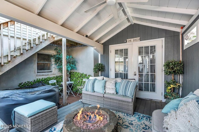 19 Gravelly Point Rd, Highlands, NJ 07732 - sunroom featuring an outdoor living space with a fire pit and french doors