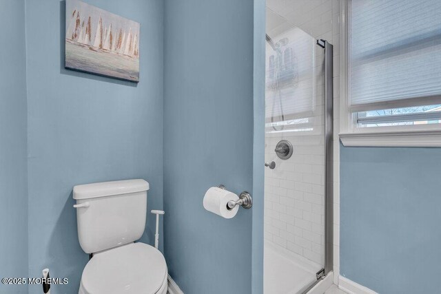 19 Gravelly Point Rd, Highlands, NJ 07732 - bathroom with a stall shower, toilet, and baseboards