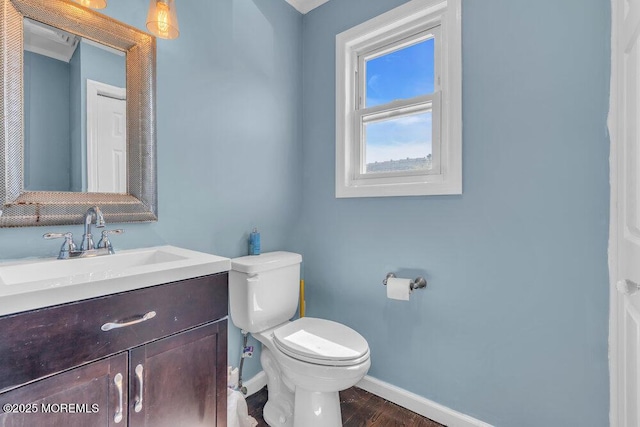 19 Gravelly Point Rd, Highlands, NJ 07732 - half bathroom featuring baseboards, toilet, vanity, and wood finished floors