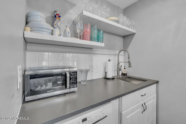 19 Gravelly Point Rd, Highlands, NJ 07732 - kitchen featuring stainless steel microwave, open shelves, a sink, and tasteful backsplash