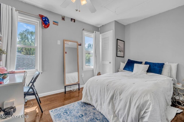 19 Gravelly Point Rd, Highlands, NJ 07732 - bedroom with attic access, multiple windows, wood finished floors, and baseboards