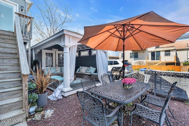 19 Gravelly Point Rd, Highlands, NJ 07732 - view of patio featuring fence, outdoor lounge area, and outdoor dining space
