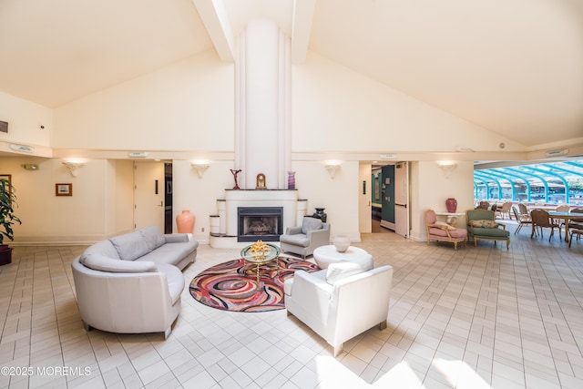 living room with beamed ceiling, a fireplace, high vaulted ceiling, and light tile patterned floors