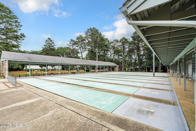 view of property's community with shuffleboard