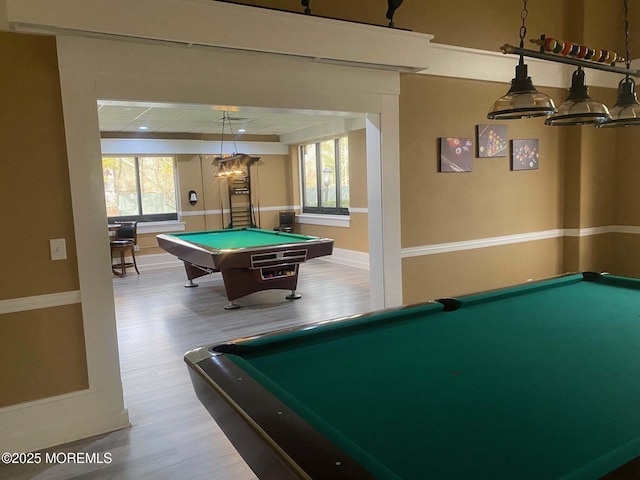 recreation room featuring wood finished floors, pool table, and baseboards
