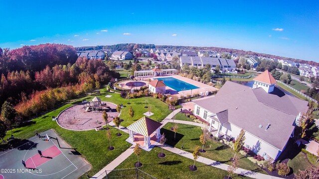 birds eye view of property with a residential view