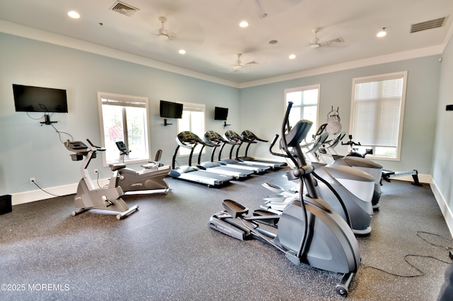exercise room with recessed lighting, baseboards, visible vents, and ornamental molding