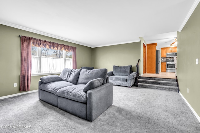 living room featuring ornamental molding, baseboards, and light carpet