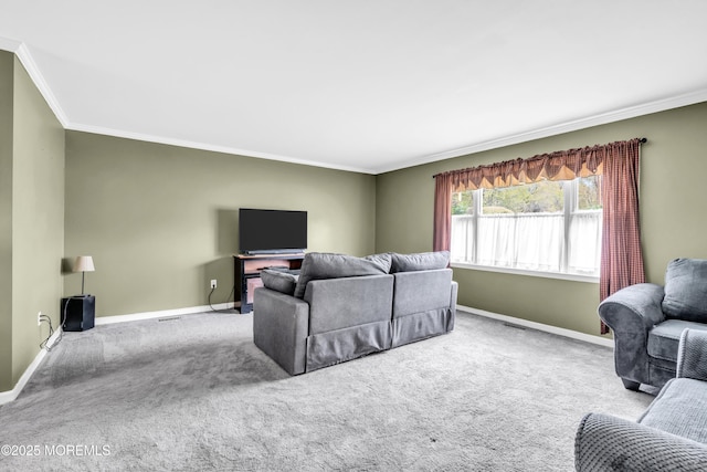 carpeted living room featuring crown molding and baseboards
