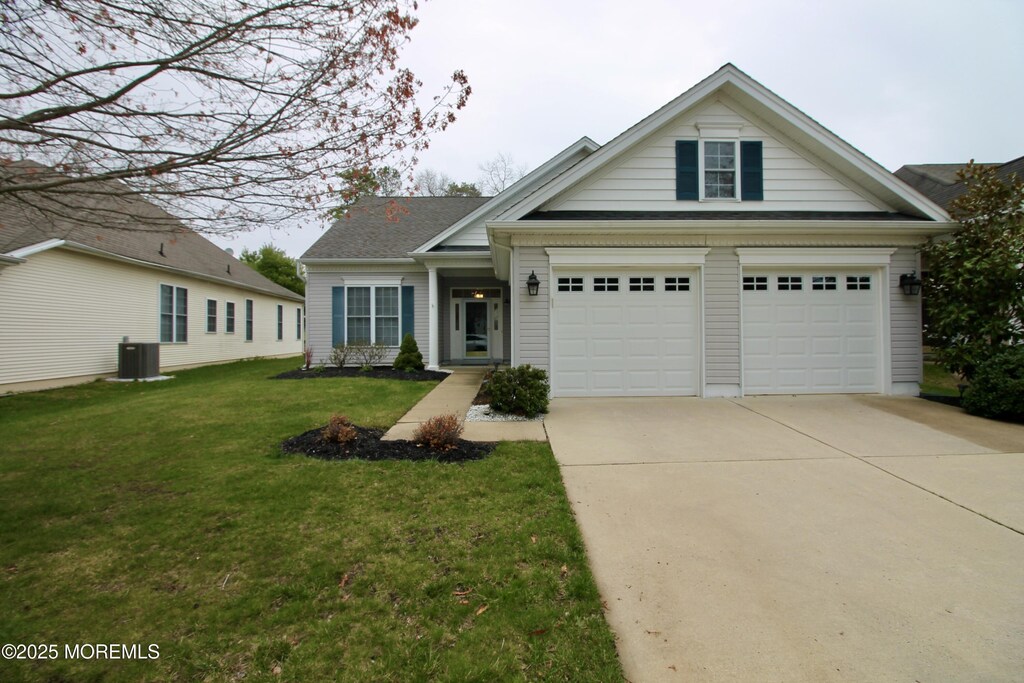 160 Wild Dunes Way, Jackson, NJ 08527 - view of front facade with central AC unit, a front lawn, and driveway