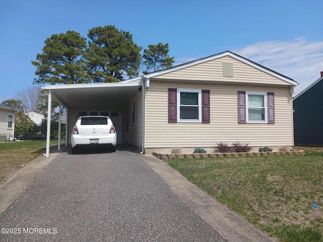 177 Pulaski Blvd, Toms River, NJ 08757 - view of front of property featuring asphalt driveway, a front lawn, and a carport