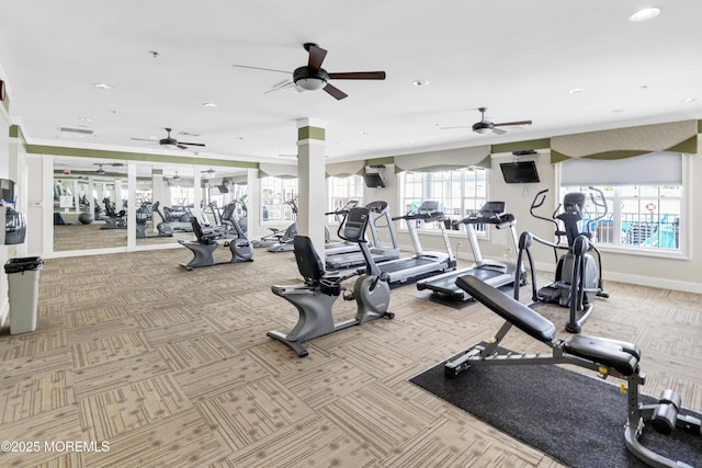 gym with a healthy amount of sunlight, ceiling fan, and recessed lighting