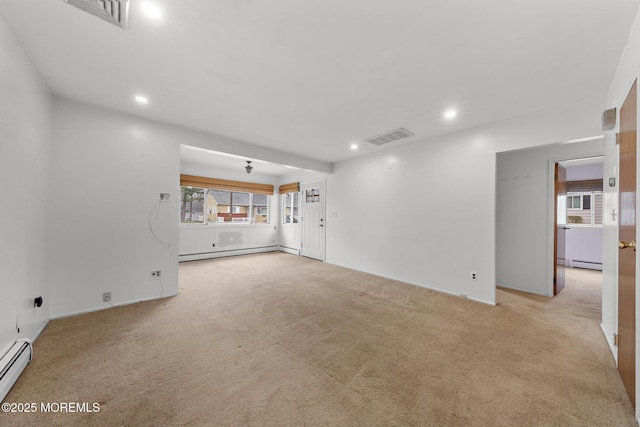 14B S Heron St, Manchester, NJ 08759 - unfurnished living room featuring a baseboard radiator, recessed lighting, light colored carpet, and baseboard heating