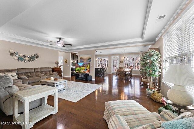 311 Newport Way, Little Egg Harbor, NJ 08087 - living room featuring a ceiling fan, a tray ceiling, visible vents, and plenty of natural light