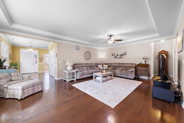 311 Newport Way, Little Egg Harbor, NJ 08087 - living area with crown molding, a ceiling fan, a raised ceiling, dark wood-type flooring, and visible vents