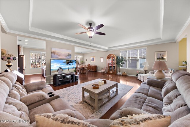 311 Newport Way, Little Egg Harbor, NJ 08087 - living area with ceiling fan with notable chandelier, wood finished floors, a tray ceiling, and ornamental molding