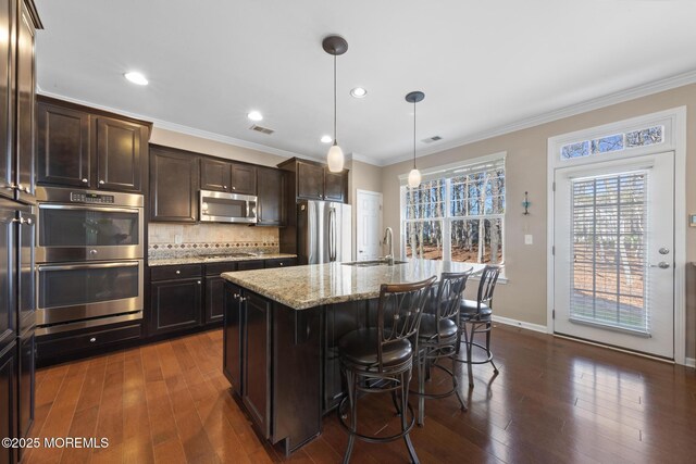 311 Newport Way, Little Egg Harbor, NJ 08087 - kitchen with light stone countertops, dark wood-style flooring, stainless steel appliances, and a sink
