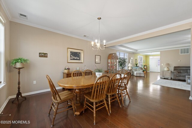 311 Newport Way, Little Egg Harbor, NJ 08087 - dining area featuring dark wood finished floors, an inviting chandelier, ornamental molding, and visible vents