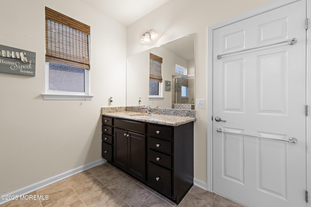 311 Newport Way, Little Egg Harbor, NJ 08087 - bathroom with vanity, tile patterned floors, baseboards, and a shower with door