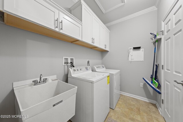 311 Newport Way, Little Egg Harbor, NJ 08087 - washroom with a sink, cabinet space, stone finish flooring, crown molding, and washer and dryer