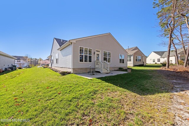 311 Newport Way, Little Egg Harbor, NJ 08087 - back of house featuring a lawn and a patio area