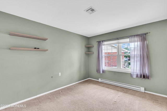 1237A Hamilton Ct, Lakewood, NJ 08701 - carpeted spare room with baseboard heating, baseboards, and visible vents