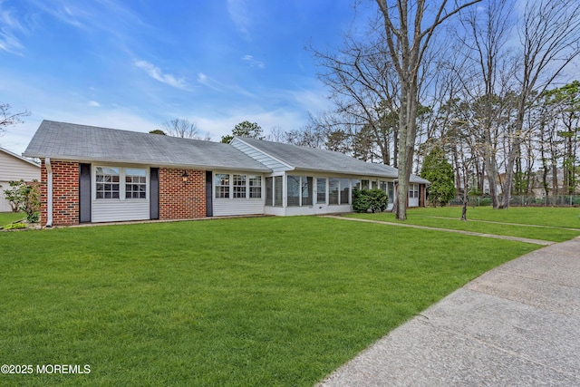 1237A Hamilton Ct, Lakewood, NJ 08701 - ranch-style home with roof with shingles, brick siding, and a front lawn
