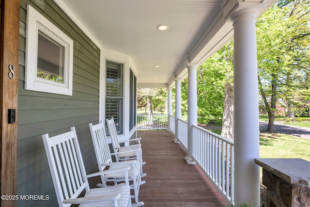 wooden deck featuring a porch