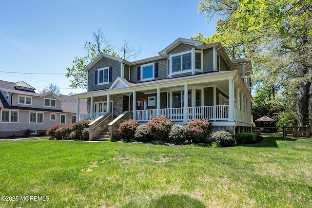 view of front of home with a porch and a front yard