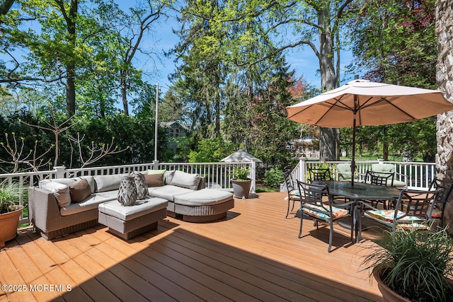 deck featuring an outdoor living space and outdoor dining area