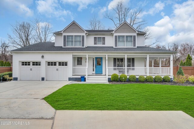 view of front facade with a front yard, a porch, a garage, driveway, and roof with shingles