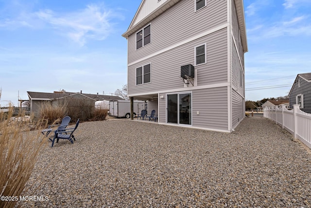 211 Pine Dr, Bayville, NJ 08721 - rear view of house featuring a patio and fence