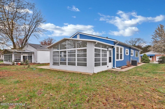 101 Torrey Pines Dr, Toms River, NJ 08757 - rear view of property featuring a yard, central AC, and a sunroom