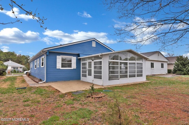 101 Torrey Pines Dr, Toms River, NJ 08757 - rear view of property with a yard, a patio area, and a sunroom