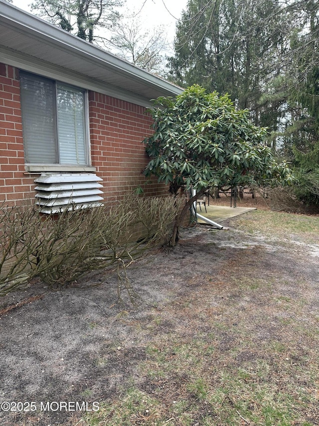 10 Homestead Dr Unit C, Whiting, NJ 08759 - view of side of property with brick siding