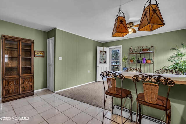 37 Scarborough Pl, Toms River, NJ 08757 - dining area featuring a baseboard heating unit, baseboards, and light tile patterned floors