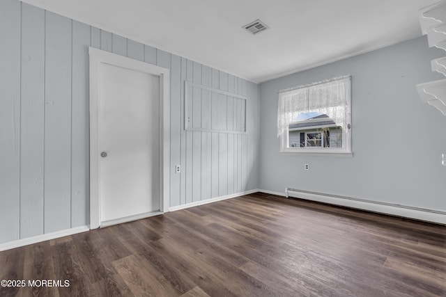 37 Scarborough Pl, Toms River, NJ 08757 - interior space featuring baseboard heating, baseboards, visible vents, and wood finished floors
