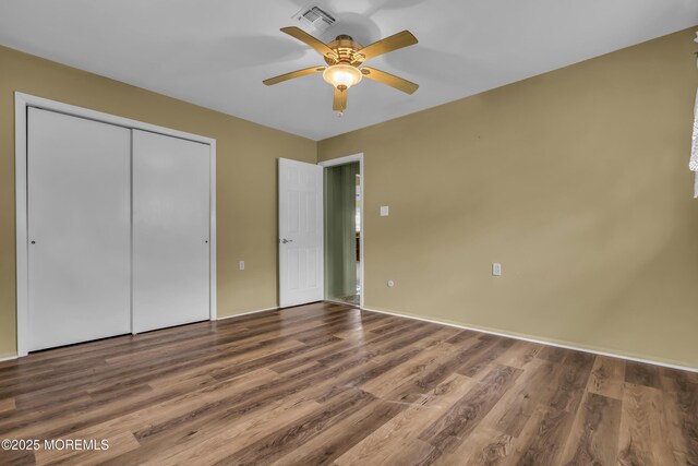 37 Scarborough Pl, Toms River, NJ 08757 - unfurnished bedroom featuring a closet, wood finished floors, ceiling fan, and visible vents