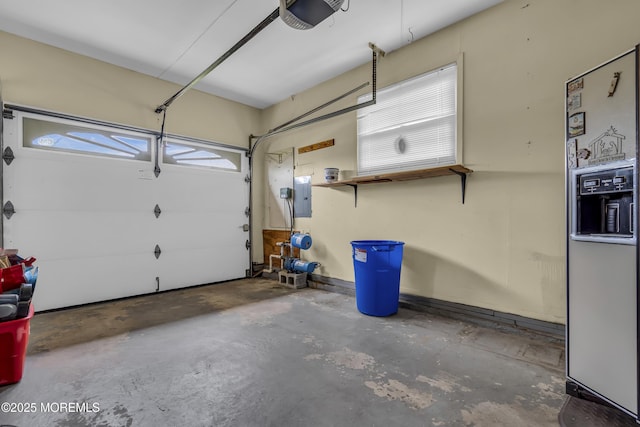 37 Scarborough Pl, Toms River, NJ 08757 - garage featuring electric panel, a garage door opener, and white fridge with ice dispenser