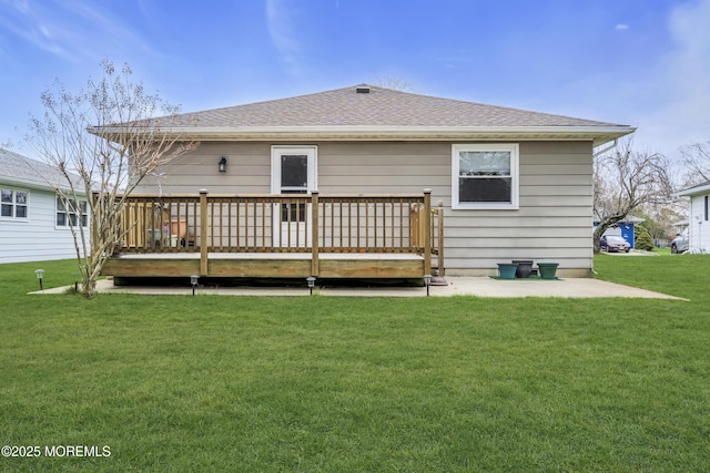 37 Scarborough Pl, Toms River, NJ 08757 - rear view of property with a yard, roof with shingles, and a deck