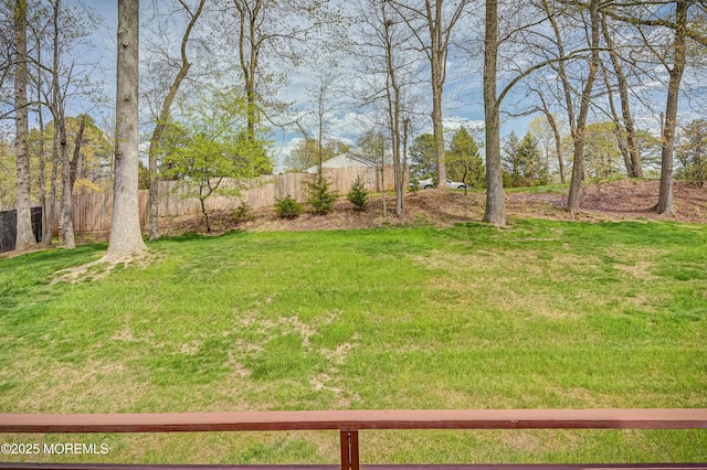 view of yard featuring fence