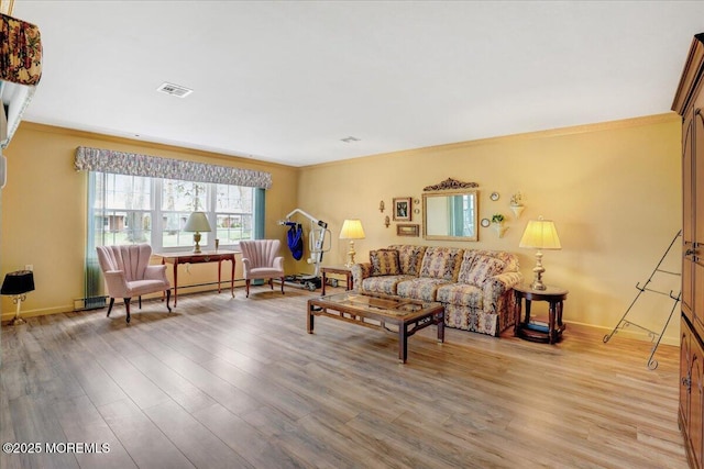 455B Portsmouth Dr, Lakewood, NJ 08701 - living room featuring crown molding, visible vents, baseboards, and wood finished floors
