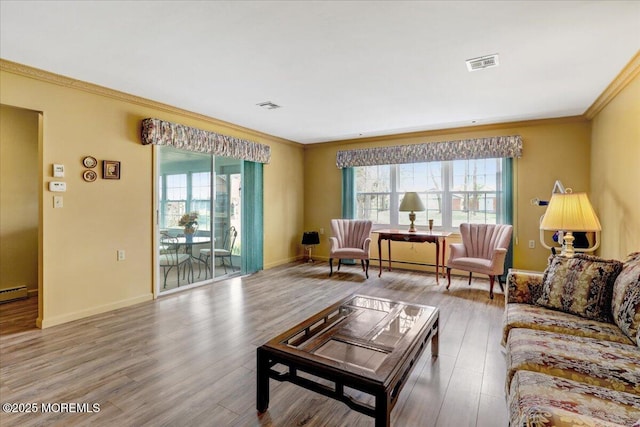 455B Portsmouth Dr, Lakewood, NJ 08701 - living room featuring a healthy amount of sunlight, ornamental molding, and visible vents