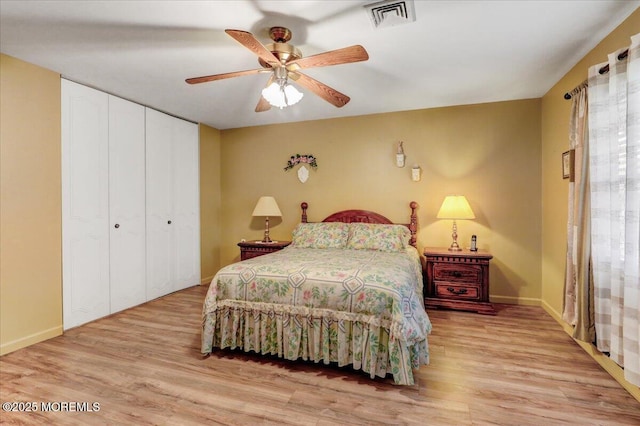 455B Portsmouth Dr, Lakewood, NJ 08701 - bedroom featuring a closet, a ceiling fan, visible vents, wood finished floors, and baseboards