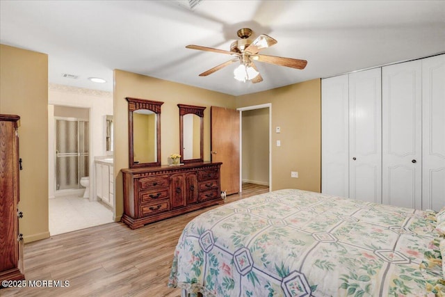455B Portsmouth Dr, Lakewood, NJ 08701 - bedroom featuring a closet, baseboards, light wood-style flooring, visible vents, and ceiling fan